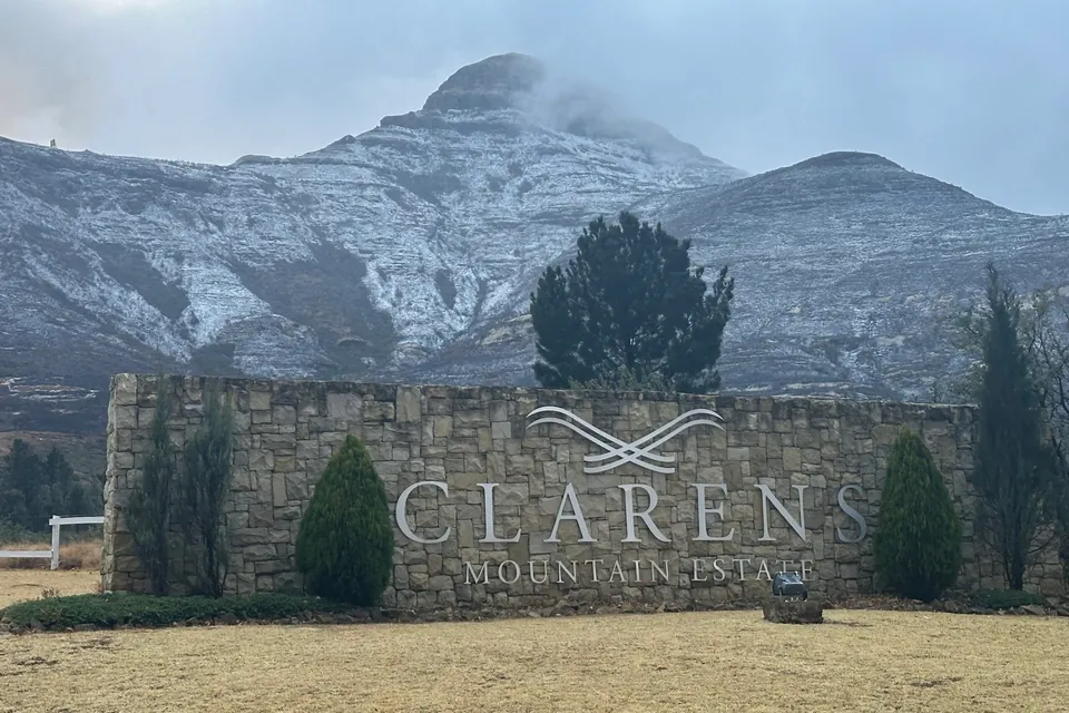 The Clarens Mountain Estate entrance monument with the mountain behind