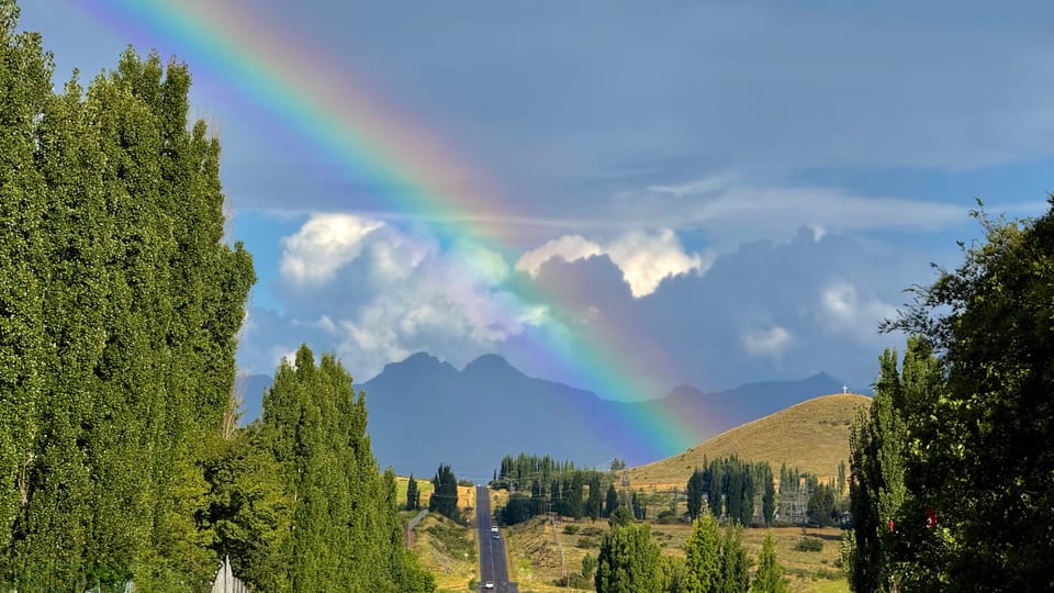 Rainbow over the road to Clarens